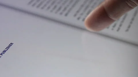 Book on a touch screen tablet computer. (4) Stock Footage 3168086
