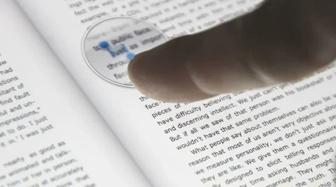 Book on a touch screen tablet computer. (9) w/ highlighting Stock Footage 3194417