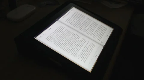 Book on a touch screen tablet computer. (6) Stock-Footage 3274770