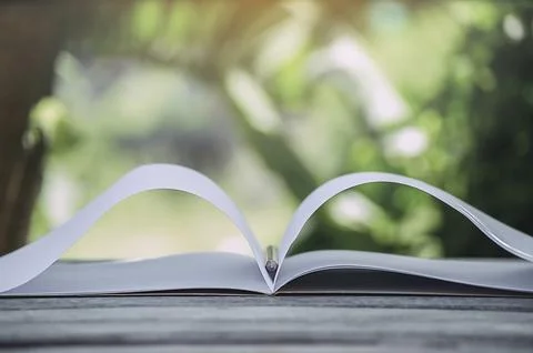 Book white note and yellow pencil On the wooden floor old, white on the bac.. Stock Photos