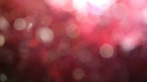 Bookeh lights blink quickly against a dark background. Beautiful bokeh moving up Stock Footage 99743658