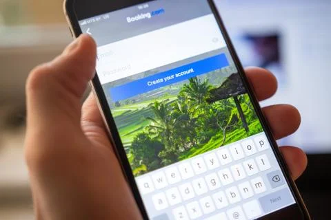 Booking application on mobile smartphone screen. Username and password for bo Stock Photos