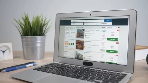 Booking a Hotel on Laptop Computer Screen Stock Footage 86868512