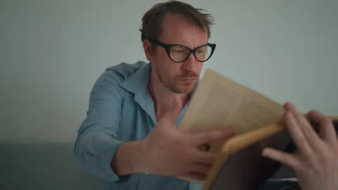 Bookish man with book Stock Footage 243276621