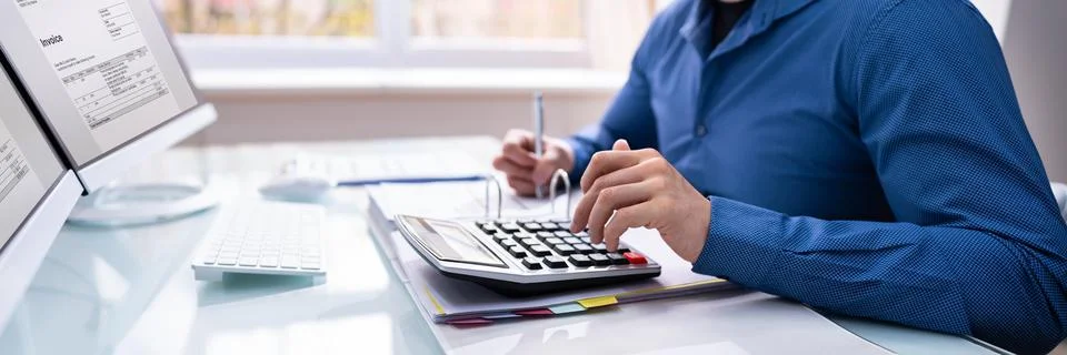 Bookkeeper Accountant Calculating Tax Invoice Stock Photos