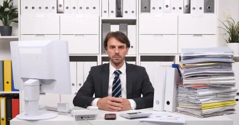 Bookkeeper Man Looking to Camera Presentation Modern Accountancy Office Concept Fotos Stock