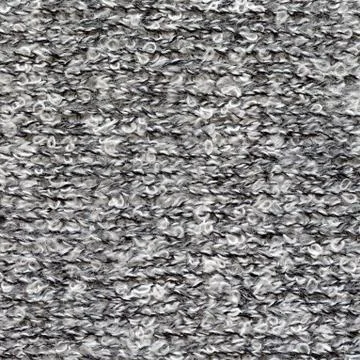 Booklet texture. Light knitted woolen fabric melange background Stock Photos