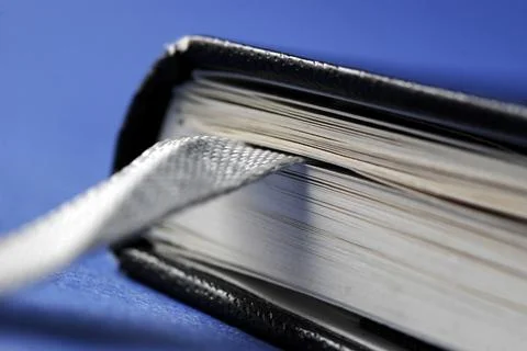 Bookmark ribbon in a notebook Stock Photos