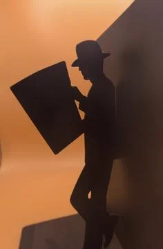 Bookmark in the shape of a man reading the newspaper Stock Photos