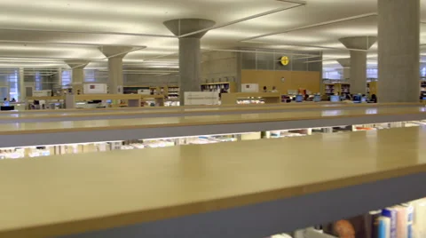 Books and computers in library 스톡 동영상 49217304