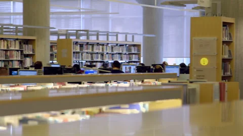 Books and computers in library Vídeo Stock 49217410
