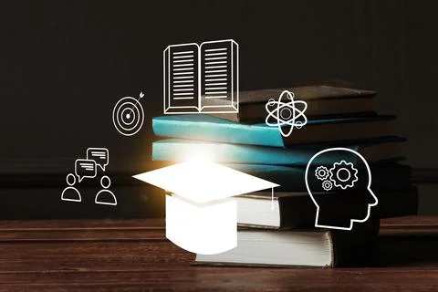 Books and learning tools on a table with educational symbols in a study area Stock Photos