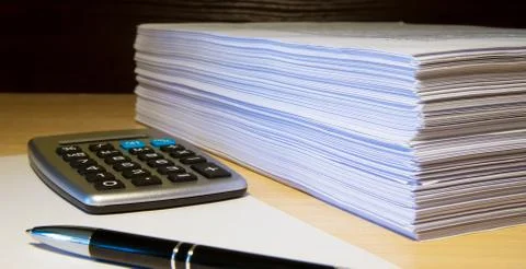 Books and papers on the table Stock Photos