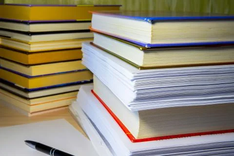 Books and papers on the table Stock Photos