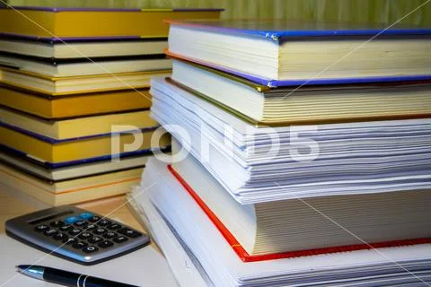 Books and papers on the table Stock Photos