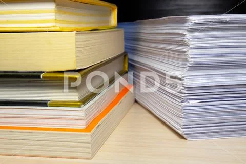 Books and papers on the table Stock Photos