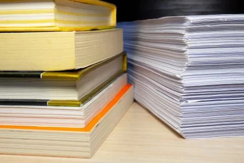 Books and papers on the table Stock Photos
