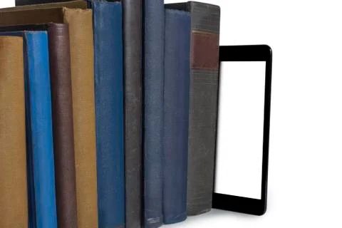 Books and tablet computer Stock Photos