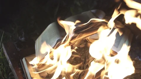 Books are burning close up Stockbeeldmateriaal 77418383