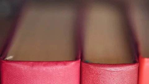 Books on bookshelf Stock Footage 81249590