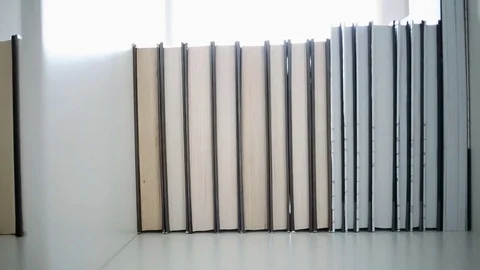 Books on a bookshelf Stock Footage 84293607