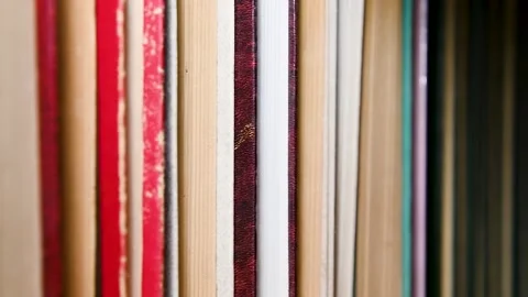Books close-up on the shelf. Stockbeeldmateriaal 238470235