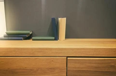 Books on a desk Stock Photos