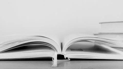 Books on the desk Stock Photos
