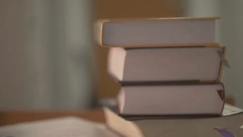 Books Focus Pull Study Research School College Reading Homework 4K Stock Footage 217985315