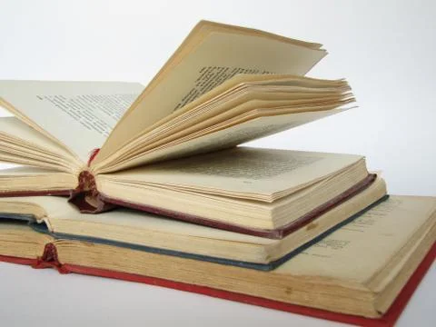 Books, knowledge, feather, is isolated. Stock Photos