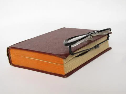 Books, knowledge, feather, is isolated. Stock Photos