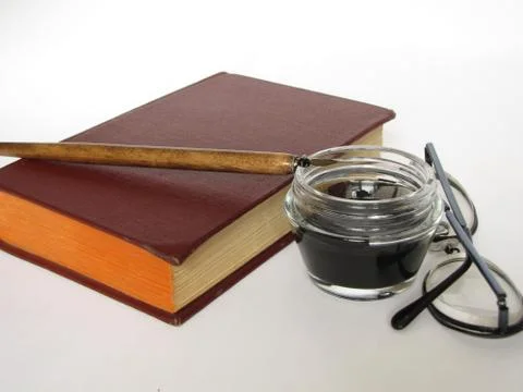 Books, knowledge, feather, is isolated. Stock Photos