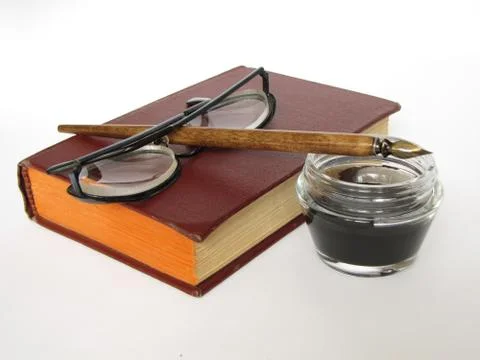 Books, knowledge, feather, is isolated. Stock Photos