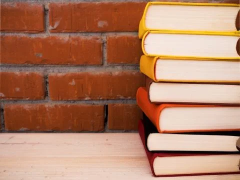Books lying on the table Stock Photos