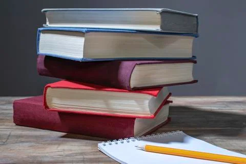 Books, notebook, pencil. Stock Photos