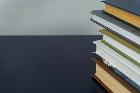 Books in a pile on a table Foto stock