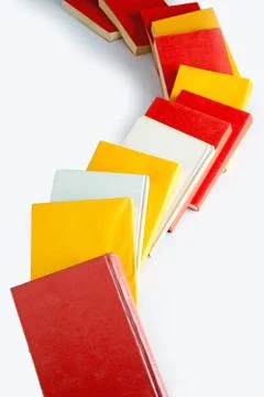 Books queue dumping Stock Photos