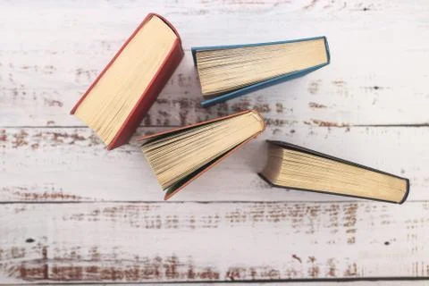 Books for reading on the table. Flat lay concept Stock Photos