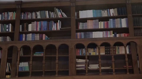 Books on a shelf in the library 動画素材 74769128