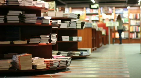Books on shelves in a bookshop Stock Footage