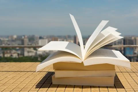 Books stack on a roof 写真素材