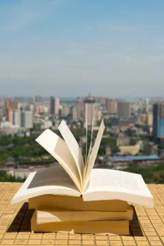 Books stack on a roof Stock Photos