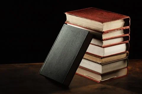 Books stack wooden table. High quality beautiful photo concept Stock Photos