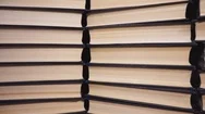 Books Stacked. Many Books Piles Stock Footage