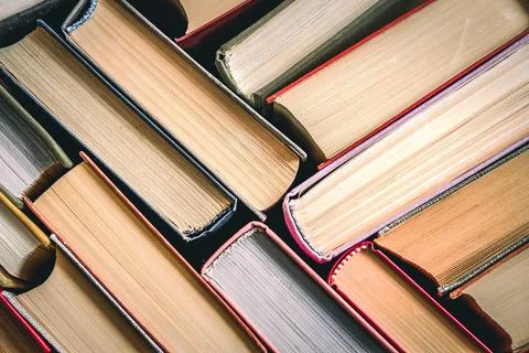 Books stacked. Stack of books background. many books piles. Stock Photos