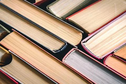 Books stacked. Stack of books background. many books piles. Stock Photos