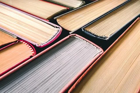 Books stacked. Stack of books background. many books piles. Stock Photos