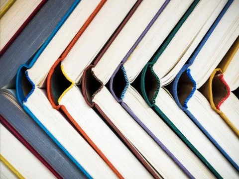 Books standing on the table Stock Photos