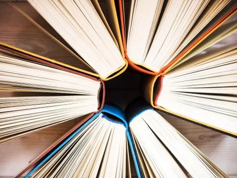 Books standing on the table Stock Photos