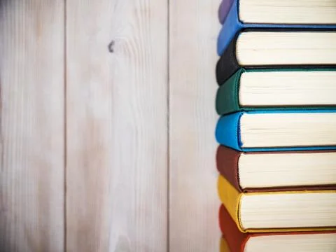 Books standing on the table Stock Photos